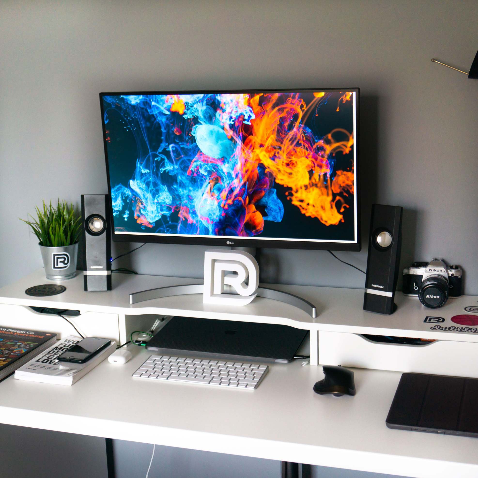 Design tokens and readable text samples on screen at a computer monitor on a desk workspace